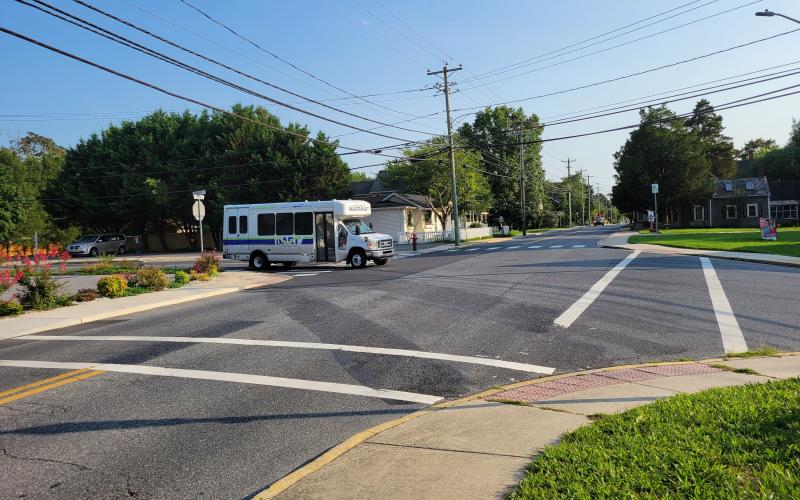 My idea for the crosswalk murals at this intersection in Milton is called Dueling Pianos, and it involves equally spaced, equally sized black and white rectangles going from one sidewalk to the next.